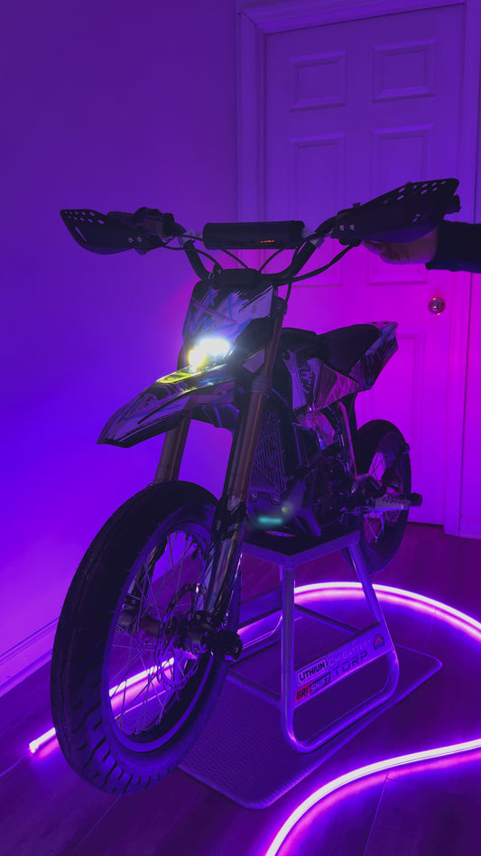 Short video showcasing the upgraded Surron Hyper Bee Headlight functions. Purple LEDs and Red lights are filling the video with colors.